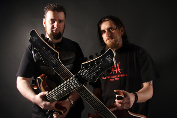 Fiachra and Gareth with their custom Mayones guitars