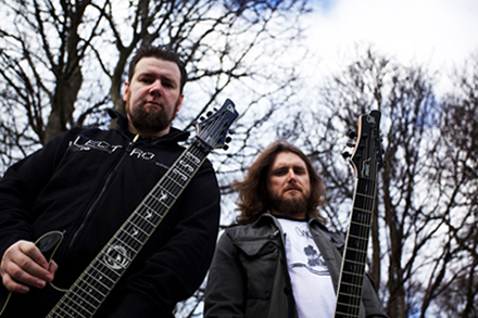 Fiachra and Gareth with their custom Mayones guitars